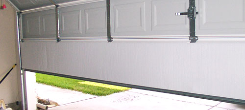 reduce the heat in your garage by insulating the door