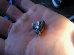 broken bolts can cause a noisy garage door